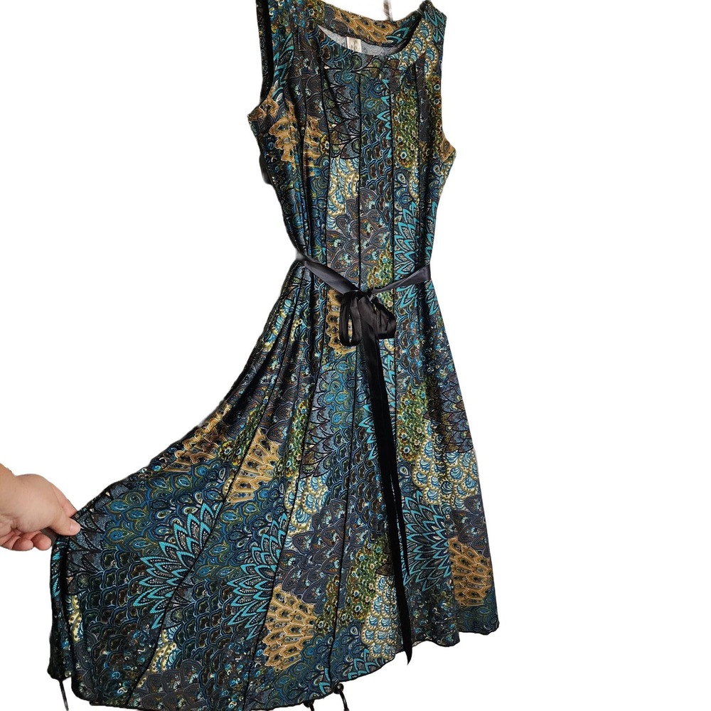Vibrant mandala like pattern fitsleeveless midi dress, peacock colors